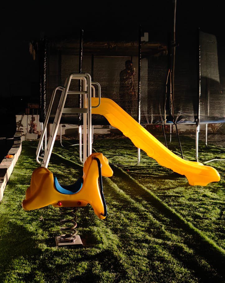 yellow single slide and spring rocking horse